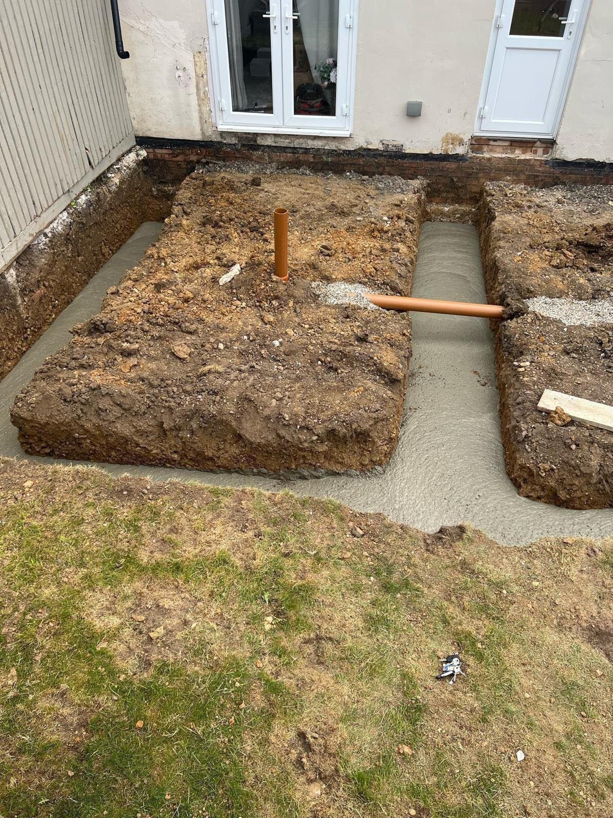 QMiX Concrete laying concrete foundations at house